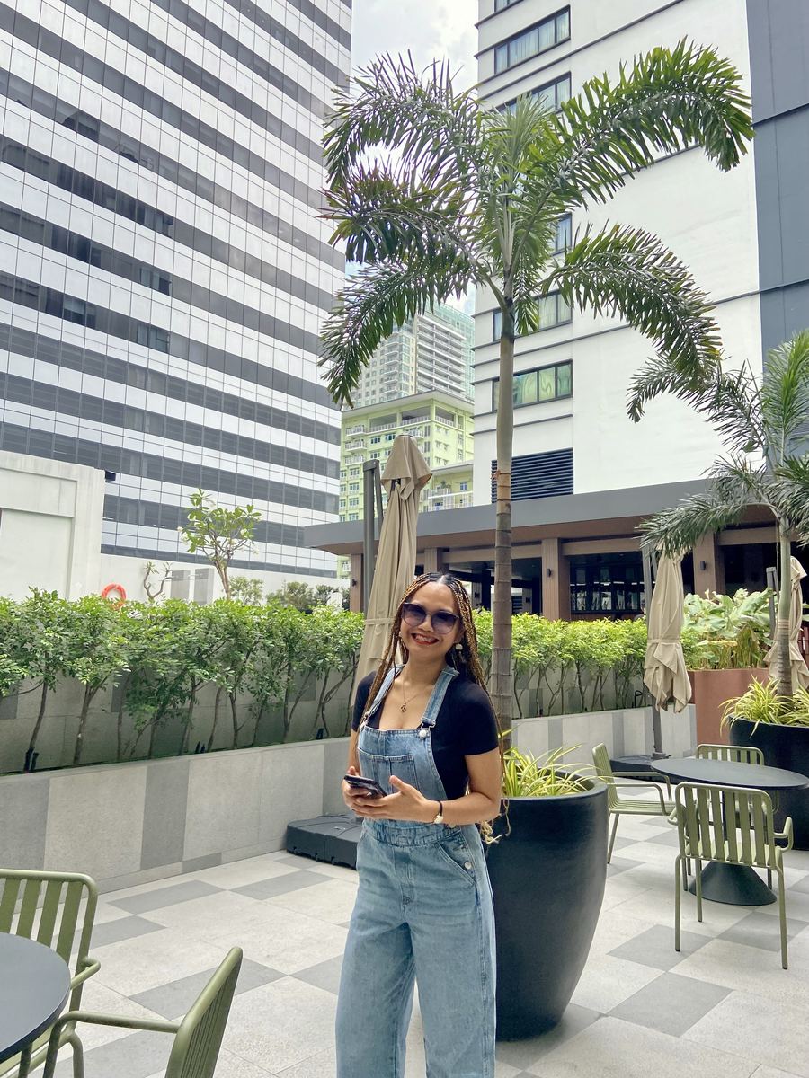 City courtyard afternoon, denim and palms